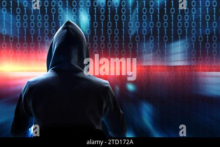 hacker in hood and binary data background, cybercrime, ransomware, data breach and phishing concept Stock Photo