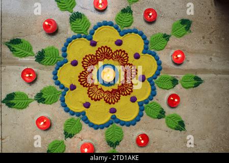 Beautiful white Flower design rangoli. Rangoli making patterns. Rangoli designs Stock Photo