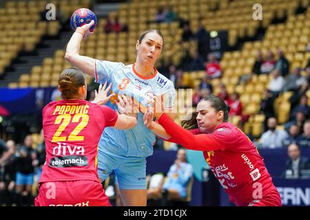 HERNING, DENMARK - DECEMBER 15: Andrijana Popovic of Montenegro, Lois Abbingh of The Netherlands, Tanja Ivanovic of Montenegro during the 26th IHF Women's World Championship Handball Final Round, 5-8 place match between Montenegro and Netherlands at Jyske Bank Boxen on December 15, 2023 in Herning, Denmark (Photo by Henk Seppen/Orange Pictures) Stock Photo