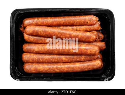 Raw barbecue sausages on a white background in a black plastic box. Pork sausage isolate Stock Photo