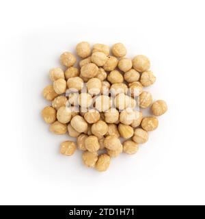 heap of roasted peeled hazelnuts isolated on white background, top view, concept of healthy breakfast, vegan food Stock Photo