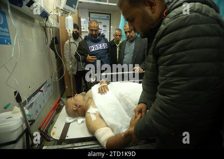 Veteran Al-Jazeera correspondent Wael Al-Dahdouh receives medical care after we was injured while covering ongoing battles between Israel and the Palestinian in Gaza, at Nasser hospital in Khan Yunis in the southern Gaza Strip on Friday, December 15, 2023. Two Al Jazeera journalists have been wounded in Khan Younis as Israel intensifies attacks on southern Gaza..White House security official Jake Sullivan says the US is pushing Israel to focus war on precise targeting of Hamas leaders, instead of widespread bombing and ground operations. Photo by Ismael Mohamad/UPI Stock Photo