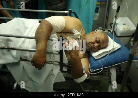 Veteran Al-Jazeera correspondent Wael Al-Dahdouh receives medical care after he was injured while covering ongoing battles between Israel and the Palestinians in Gaza, at Nasser hospital in Khan Yunis in the southern Gaza Strip on Friday, December 15, 2023. Two Al Jazeera journalists have been wounded in Khan Younis as Israel intensifies attacks on southern Gaza. White House security official Jake Sullivan says the U.S. is pushing Israel to focus war on precise targeting of Hamas leaders, instead of widespread bombing and ground operations.    Photo by Ismael Mohamad/UPI Stock Photo