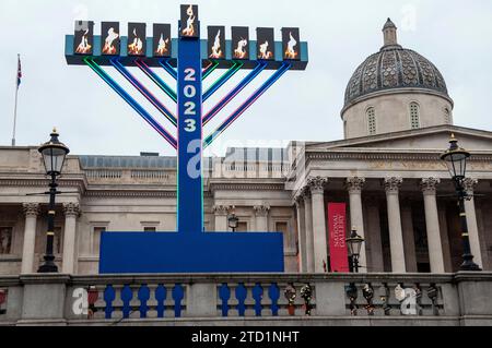 London, UK, 15 Dec 2023   Giant menorah lit up for Chanukah, the Jewish festival of lights, in Trafalgar Square. The menorah will be on display from Thursday 7 December until Thursday 14 December, with one of the lights lit at 4pm each day and at 5.15pm on Saturday. Credit: JOHNNY ARMSTEAD/Alamy Live News Stock Photo
