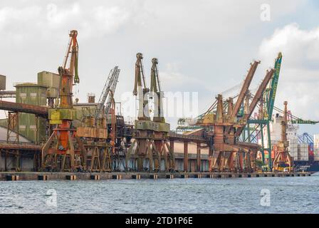 Santos city, Brazil. Old cranes at the grain export terminal at the port of Santos. Stock Photo