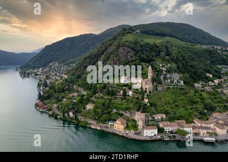 Aerial image of the parish church Madonna del Sasso stands on the high hill of Vico Morcote. Morcote at the Lake Lugano was once credited as one of th Stock Photo