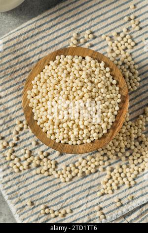 Organic Dry Large Couscous in a Bowl Stock Photo