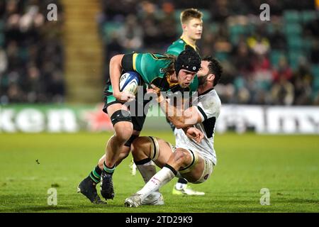 Northampton Saints' Alexander Moon is tackled by RC Toulon's Charles Ollivon during the Investec Challenge Cup match at cinch Stadium at Franklin's Gardens, Northampton. Picture date: Friday December 15, 2023. Stock Photo