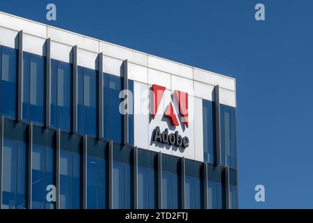 Close up of Adobe logo on the building at its new campus in Lehi City, UT, USA Stock Photo