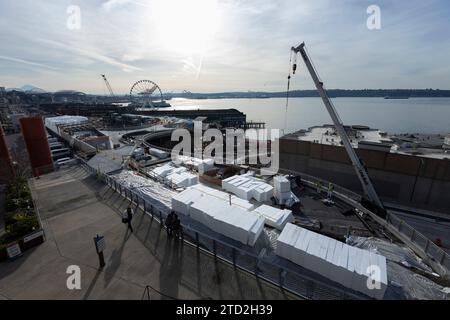Seattle, Washington, USA. 12th December, 2023. View of the Overlook Walk under construction over Alaskan Way. The Seattle Waterfront Redevelopment project including a park promenade, bike lanes and new public plazas is scheduled to be completed sometime in 2025. Credit: Paul Christian Gordon/Alamy Live News Stock Photo