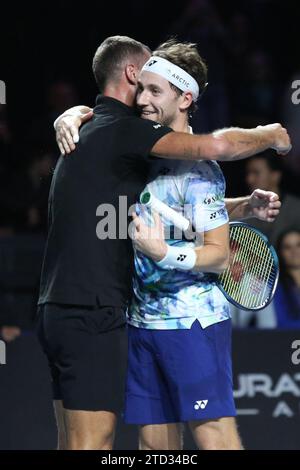 London, UK. 15th Dec 2023. Benoit 'The Rebel' Paire and Casper 'The Iceman' Ruud embrace after their game during the UTS London Tennis at the ExCel Centre, London Docklands, UK on 15 December 2023. Photo by Joshua Smith. Editorial use only, license required for commercial use. No use in betting, games or a single club/league/player publications. Credit: UK Sports Pics Ltd/Alamy Live News Stock Photo