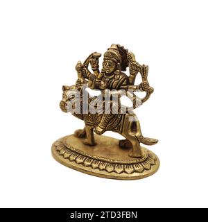 statue of goddess durga devi of hindu religion holding multiple weapons in her many arms, sitting on her lion Stock Photo