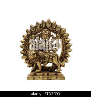 statue of goddess durga devi of hindu religion holding multiple weapons in her many arms, sitting on her lion Stock Photo