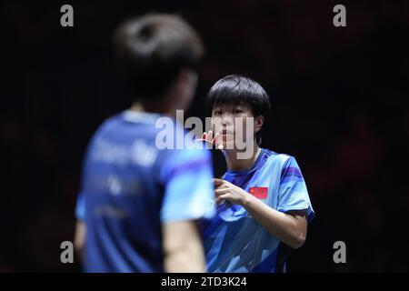 (231216) -- NAGOYA, Dec. 16, 2023 (Xinhua) -- Wang Yidi (R) of China reacts during the women's singles quarterfinals against Zhang Rui of China at the WTT Finals Women Nagoya 2023 table tennis tournament in Nagoya, Japan, on Dec. 16, 2023. (Xinhua/Zhang Xiaoyu) Stock Photo