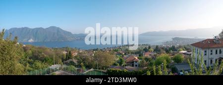 Panoramic view of the picturesque lake Lago Maggiore in northen Italy during the summer and holidays time, view from Intra. Stock Photo