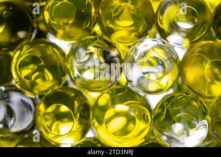 Abstract texture, yellow and white  crystalline balls of hydrogel for the background. Hydrogel beads. Close up Stock Photo