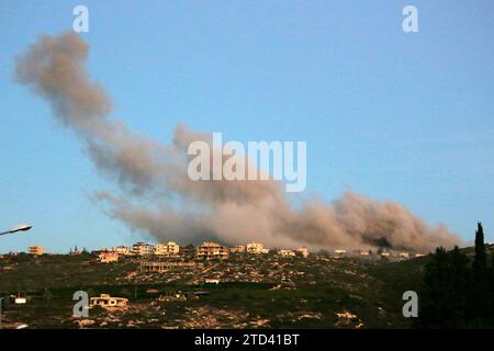 Beirut, Lebanon. 15th Dec 2023. This photo taken from Chama, Lebanon on Dec. 15, 2023 shows smoke rising after an Israeli airstrike. (Photo by Ali Hashisho/Xinhua) Credit: Xinhua/Alamy Live News Stock Photo