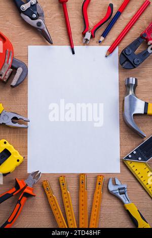 Organised copying area white blank sheet of paper and tools on wooden board Stock Photo