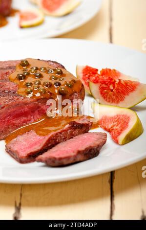Beef filet mignon with green peppercorn creamy sauce ou poivre vert Stock Photo