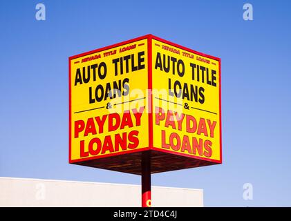 Las Vegas, Nevada, United States - November 6th, 2023: Payday Loans sign on pole in sky Stock Photo