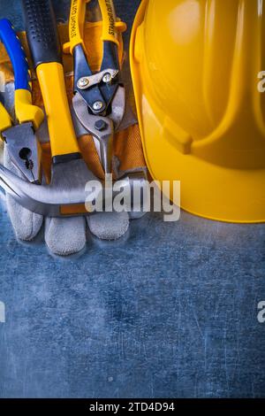 Composition of working tools on scratched vintage metallic background construction concept Stock Photo