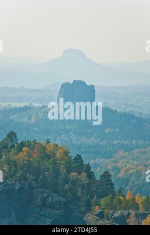 View from the Carola rock into the Schrammstein area in the back of Saxon Switzerland, to the Falkenstein and the Lilienstein Stock Photo