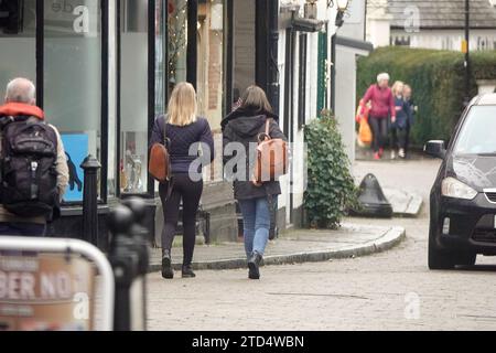 High Street, Godalming. 16th December 2023. A cold and cloudy morninig across the Home Counties. People Christmas shopping in Godalming in Surrey. Credit: james jagger/Alamy Live News Credit: james jagger/Alamy Live News Stock Photo