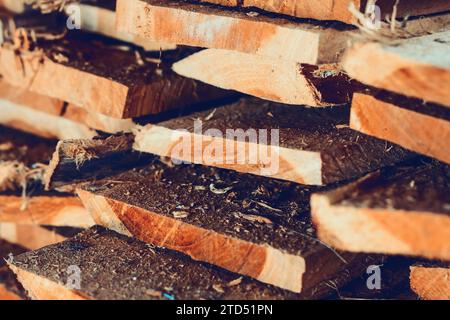 Large stack of wood planks, teak wood Stock Photo