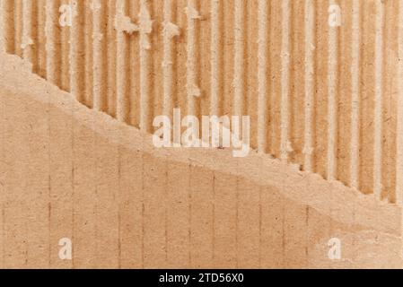 Texture of torn cardboard. Corrugated cardboard background Stock Photo