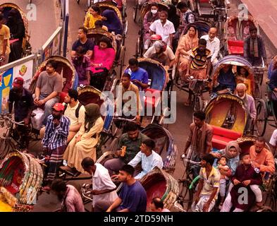 Dhaka, Bangladesh-December,5,2023: Overcrowded completely with rickshaws,cycle rickshaw traffic jam in a busy street in Dhaka.Asiaimage Stock Photo