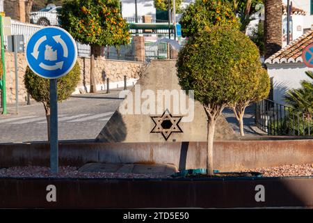 Roundabout with the Star of David, representing Judaism. On the opposite sides of the roundabout are the Christian cross, representing Christianity, and the crescent, representing Islam Frigiliana Plaza de las Tres Culturas Spain Copyright: xKristianxTuxenxLadegaardxBergx IMG 1101 Stock Photo