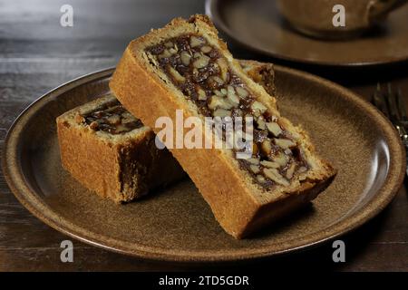 Engadine walnut cake on coffee table Stock Photo