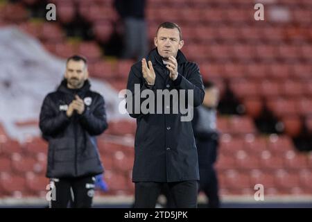 Neill Collins Head coach of Barnsley applauds the fans during the Sky Bet League 1 match Barnsley vs Charlton Athletic at Oakwell, Barnsley, United Kingdom, 16th December 2023  (Photo by Mark Cosgrove/News Images) in Barnsley, United Kingdom on 12/16/2023. (Photo by Mark Cosgrove/News Images/Sipa USA) Stock Photo