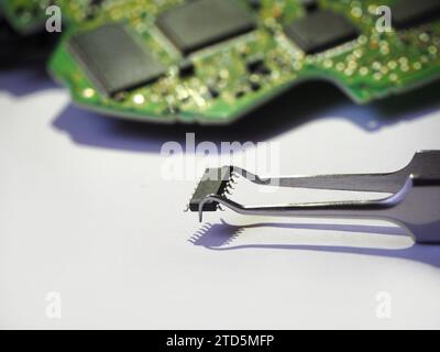 Semiconductor component supply. Microchip spare parts in the electronics industry. (Smt IC) Integrated circuit assembly. Stock Photo