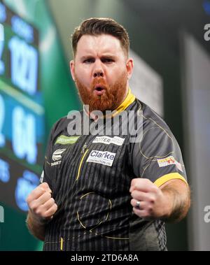 Scott Williams celebrates his victory over Rob Cross during day nine of ...