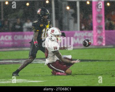 December 16, 2023: Miami (Oh) wide receiver Gage Larvadain (10) makes a first down catch in front of Appalachian State cornerback Omari Philyaw (16) during NCAA football game in the Avocados from Mexico Cure Bowl between Appalachian State Mountaineers and Miami RedHawks at FBC Mortgage Stadium in Orlando, FL. Romeo T Guzman/Cal Sport Media Stock Photo