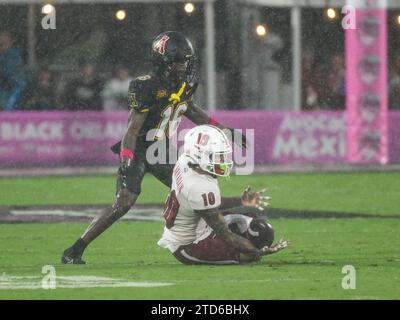 December 16, 2023: Miami (Oh) wide receiver Gage Larvadain (10) makes a first down catch in front of Appalachian State cornerback Omari Philyaw (16) during NCAA football game in the Avocados from Mexico Cure Bowl between Appalachian State Mountaineers and Miami RedHawks at FBC Mortgage Stadium in Orlando, FL. Romeo T Guzman/Cal Sport Media Stock Photo