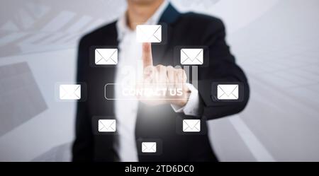 e-mail and marketing concept. Double exposure Businessman touch Email pressing for sending the e-mail from the laptop computer, Concept of sending ema Stock Photo