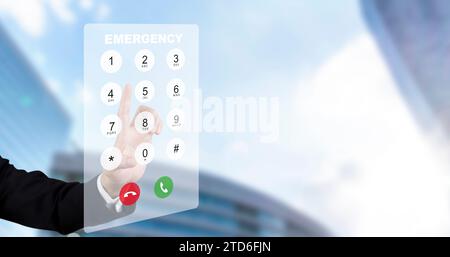 Dialing on virtual telephone keypad with transparent telephone buttons, businessman touch Emergency button of telephone number on screen, Finger touch Stock Photo