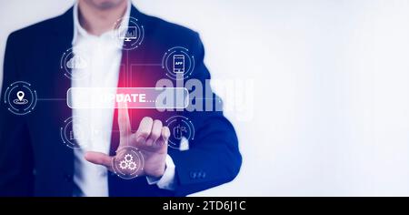 Businessman touch bar of Update Software Computer Program Upgrade Business Technology Internet, Update on virtual screen. Internet and technology conc Stock Photo