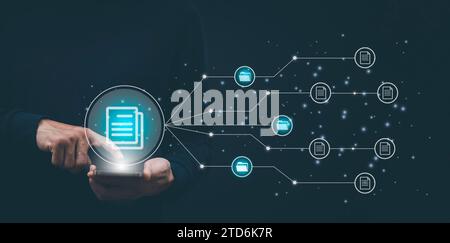 Document Management System (DMS). Archiving software for business file, Businessman touch folder document Management System, online documentation data Stock Photo