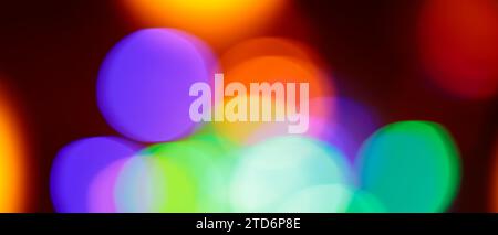 Abstract Colorful Bokeh Blurred Lights on Dark Background Stock Photo