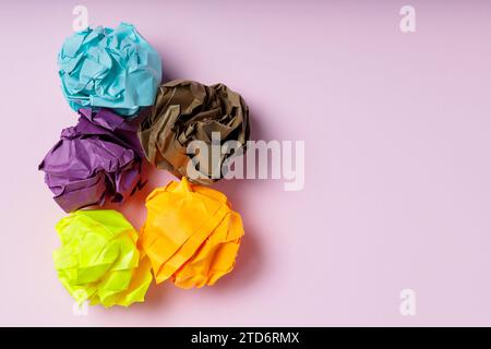 Crumpled Paper Balls on Pink Background, Mental Instability Concept Stock Photo