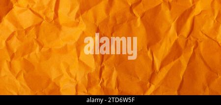 Orange Crumpled Paper Texture, Abstract Backdrop from Crumpled Orange Paper Stock Photo