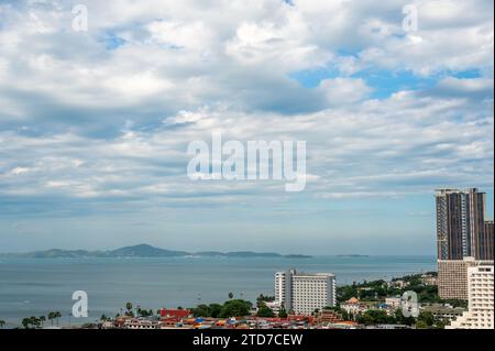 Pattaya, Thailand - December 15, 2023: sea view near Jomtien beach. Koh Larn island on horizon. seascape with clouds. Pattaya, Thailand coastal scener Stock Photo