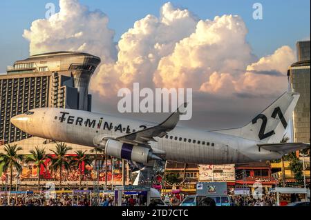 Pattaya, Thailand - December 15, 2023: airplane installed near Terminal 21 shopping center, famous place in resort city of Pattaya. against backdrop o Stock Photo