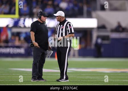 December 16, 2023, Los Angeles, California, USA: UCLA head coach CHIP KELLY speaks to the referee during the 2023 Starco Brands LA Bowl Hosted by Gronk between UCLA and Boise State at SoFi Stadium in Los Angeles, California. (Credit Image: © Brenton Tse/ZUMA Press Wire) EDITORIAL USAGE ONLY! Not for Commercial USAGE! Stock Photo