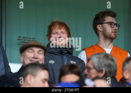 Ipswich, England, UK. 16th Dec, 2023. Ed Sheeran smiles during the Ipswich Town FC v Norwich City FC sky bet EFL Championship match at Portman Road, Ipswich, England, United Kingdom on 16 December 2023 Credit: Every Second Media/Alamy Live News Stock Photo