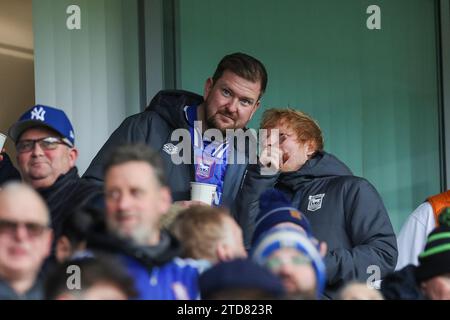 Ipswich, England, UK. 16th Dec, 2023. Ed Sheeran in the crowd gestures during the Ipswich Town FC v Norwich City FC sky bet EFL Championship match at Portman Road, Ipswich, England, United Kingdom on 16 December 2023 Credit: Every Second Media/Alamy Live News Stock Photo