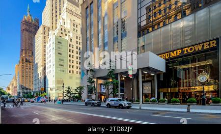 New York, USA; December 10, 2023: The famous facade of the trump tower with its iconic gold clock, in the middle of 5th Avenue in the Big Apple in New Stock Photo